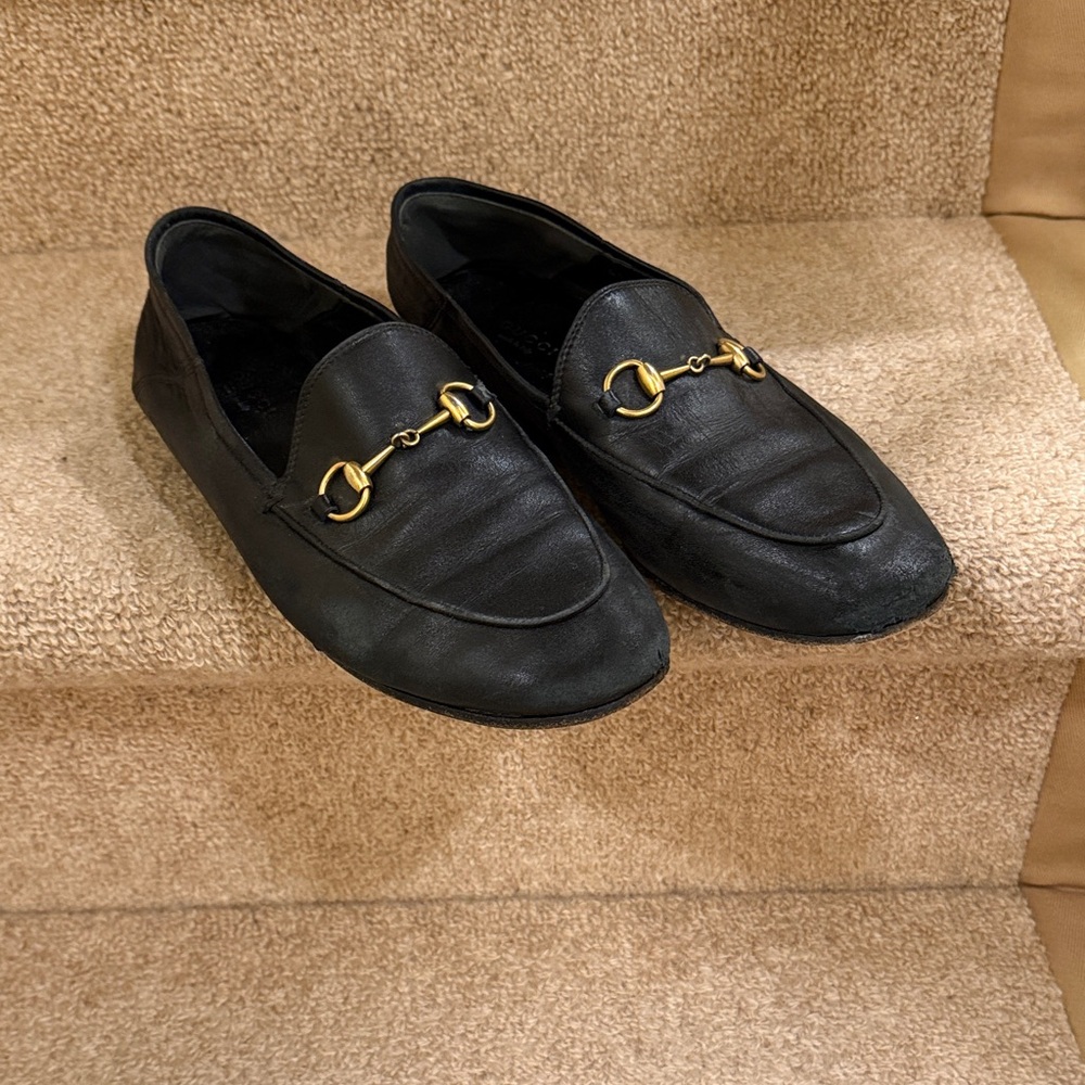 Black Gucci horsebit Leather Loafers with Gold Detail